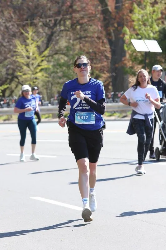 Uken team member running in the Sporting Life 10K