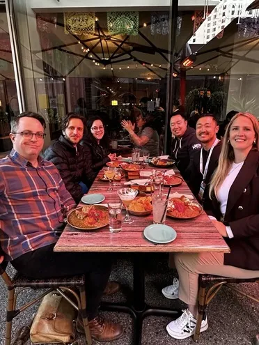 Uken team members having dinner at GDC