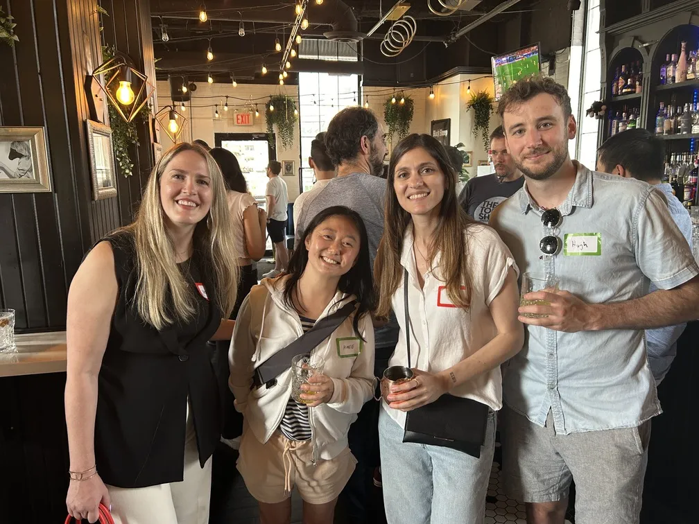 Uken team members at a bar gathering